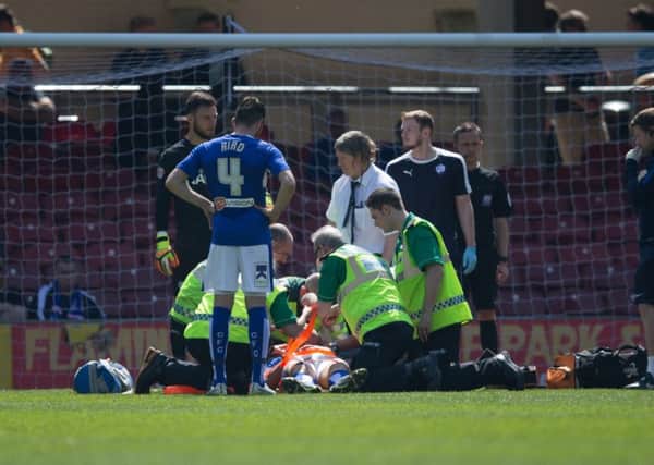 Bradford City vs Chesterfield - Tom Anderson is stretchered off - Pic By James Williamson