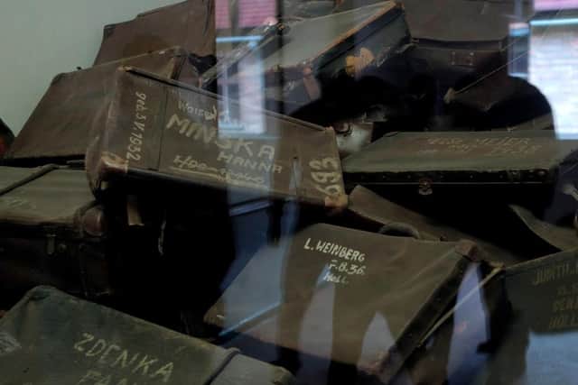 Suitcases of prisoners seized by Nazis now form part of an exhibition in Auschwitz