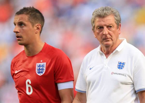 Ex-Blade Phil Jagialka, who has been out with a hamstring injury, with England manager Roy Hodgson. Photo: Mike Egerton/PA Wire.