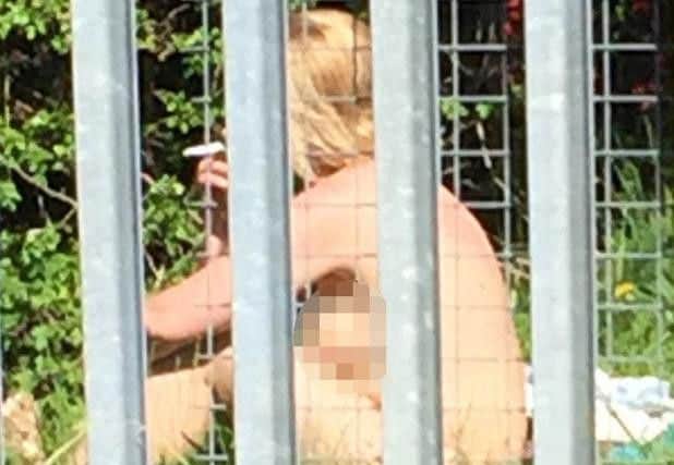 The woman in the Doncaster sex video enjoys a cigarette - her antics have made worldwide headlines.