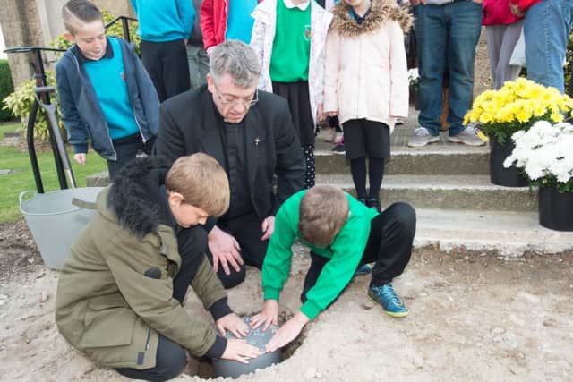 Time capsule buried at Goldthorpe Church by local school children from Goldthorpe Primary and Father Schaefer