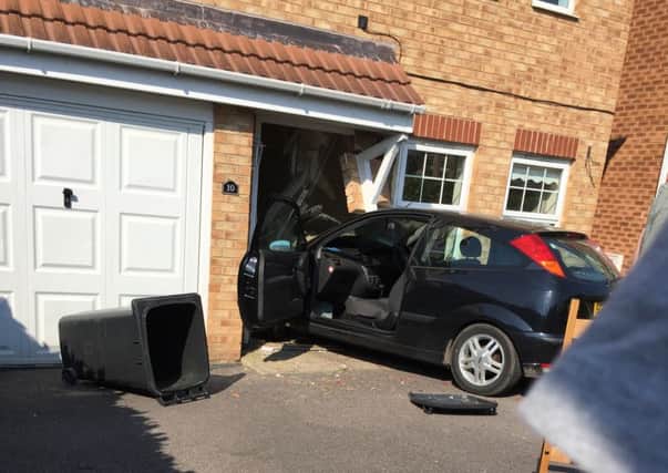 The car hit the house with considerable force (photo: Richard Robinson).