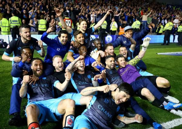 Sheffield Wednesday celebrate after the final whistle during the Sky Bet Championship play off, second leg match at the AMEX Stadium, Brighton. Pic: Gareth Fuller/PA Wire.
