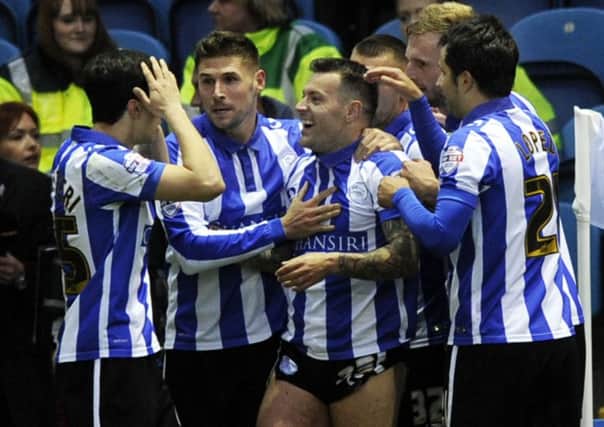 Wednesday players celebrate after Ross Wallace gave them the lead