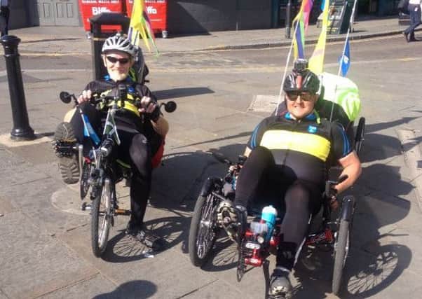 (L to R) Malcolm Carline, 69 and Darren Sables, 29 setting off on their 900 mile cycle from Doncaster to Devon and back again to raise cash for Guide Dogs UK