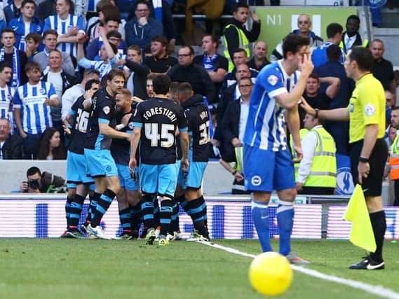 Sheffield Wednesday players celebrate Ross Wallace's equaliser at the Amex