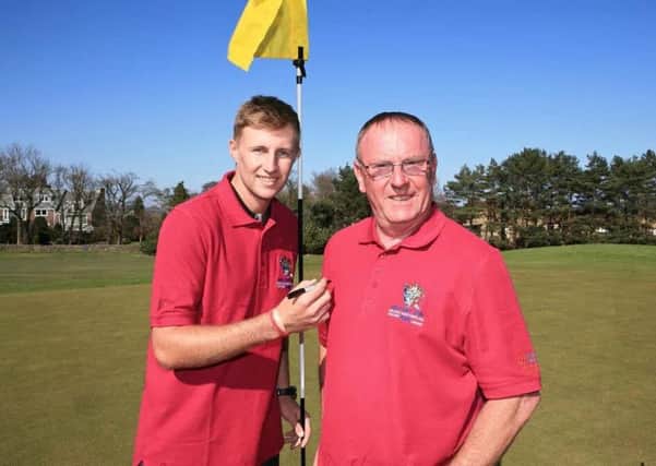 John Price with Sheffield's England cricketer Joe Root at a golf day