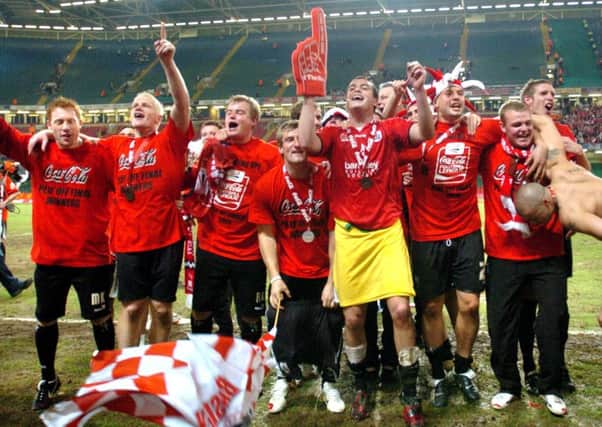 Barnsley celebrate promotion in the paly off final ar Cardiff in 2006