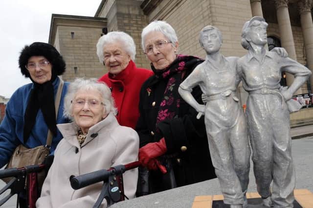 Women Of Steel survivors with a model of their statue where it will go up outside Sheffield City Hall.