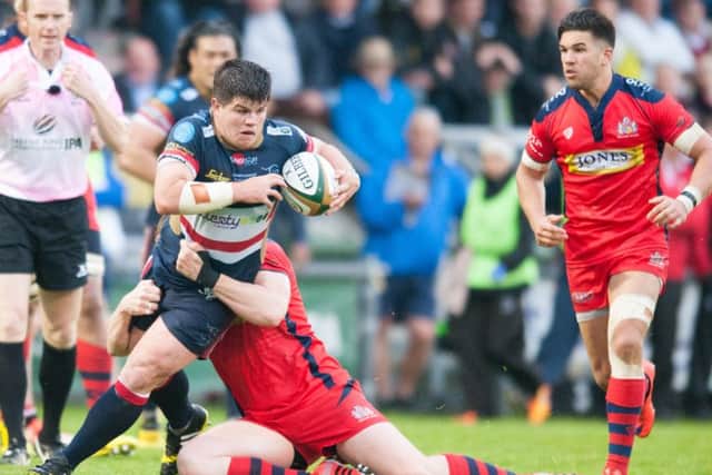 Ben Hunter tries to break clear.