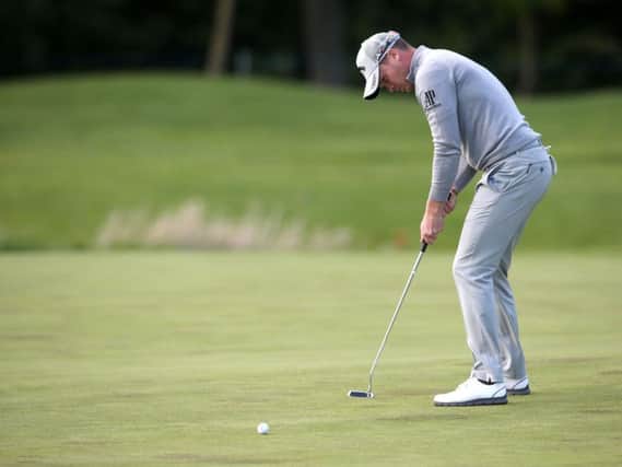 England's Danny Willett putts on the 18th hole during day one of the Irish Open at The K Club, County Kildare. PRESS ASSOCIATION Photo.