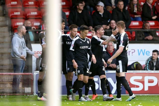 Barnsley's Adam Hammill (second right) celebrates scoring his side's first goal PRESS ASSOCIATION Photo.