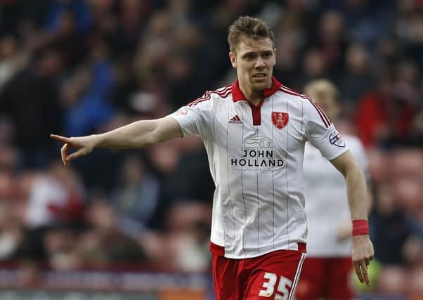 Dean Hammond activated a clause to gain a 12-month deal at Sheffield United