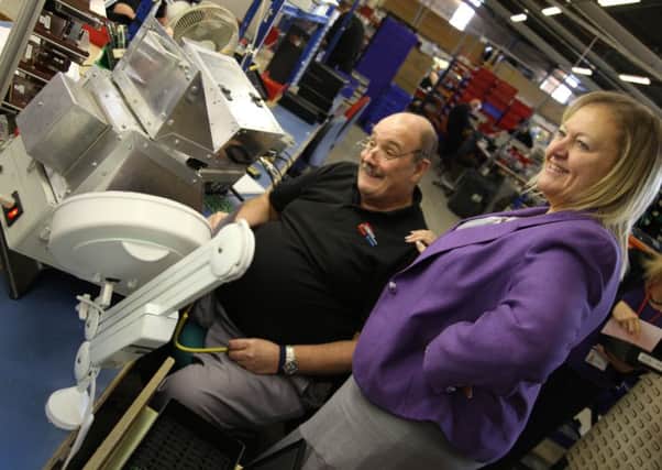 Julie Kenny CBE, on the shop floor at Pyronix in Rotherham