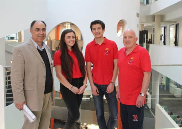 Professor Pilakoutas with Keith Brook, Head of Sixth Form at Birkdale School and some pupils.