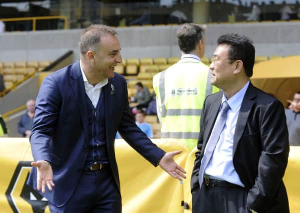 Owls Carlos Carvalhal with Chairman Dejphon Chansiri before the game...Pic Steve Ellis