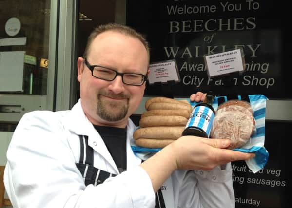 Butcher Chris Beech, of Beeches of Walkley, with the Sheffield Wednesday sausages and burgers made especially for the play-offs