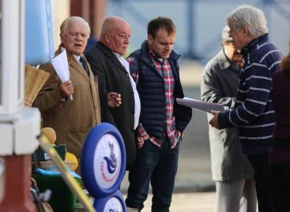 Tim Healy (centre) filming Still Open All Hours in Doncaster with Sir David Jason (left) and James Baxter.