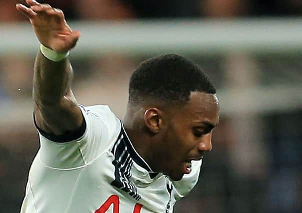 Tottenham Hotspur's Danny Rose battle for the ball