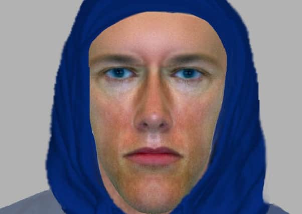 Efit of man who robbed 71-year-old at gunpoint in his own home