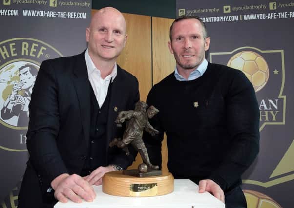 John Hartson, left, and Michael Appleton with the Youdan Trophy at the draw. Photo by Glenn Ashley.