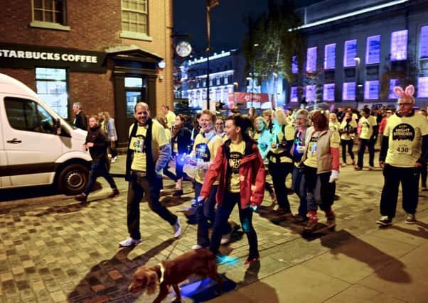 Walkers take part in last year's Night Strider event.
