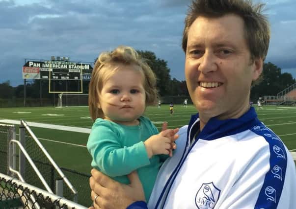 New Orleans based Owls fan Jamie Midgley with daughter Madeleine whose middle name is Wednesday