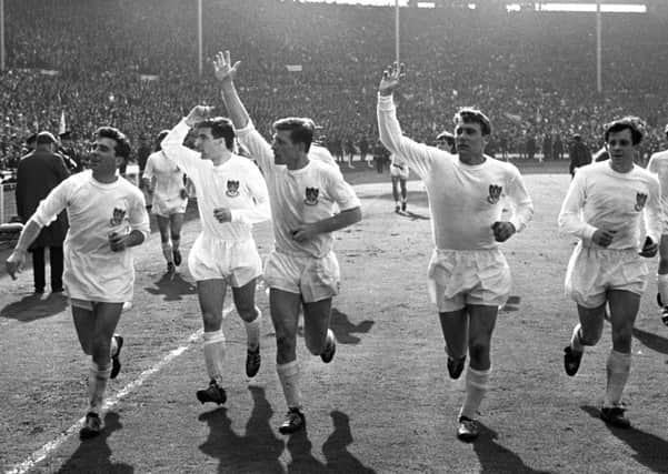 Wednesday become the first losing FA Cup finalists to do a lap of honour - from the left: Johnny Quinn, David Ford, Don Megson, Wilf Smith and Johnny Fantham