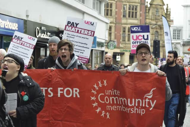 Lecturers and students picket in Sheffield city centre. Photo by Chris Carter