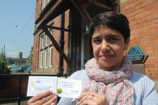 St Wilfrid's Centre for the homeless, vulnerable and socially-excluded. Office manager Helen Lowry with the meal tickets.