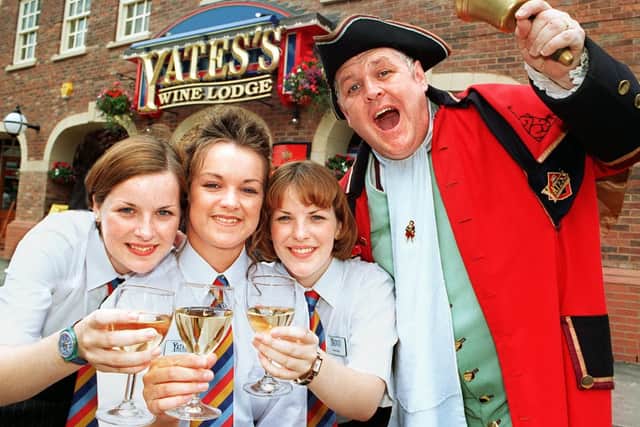 Staff at the opening of the pub as Yates's Wine Lodge in 1997.
