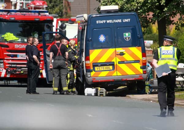 A police-led operation, supported by officers from South Yorkshire Fire and Rescue, Yorkshire Ambulance Service and Rotherham Council, is currently under way at a property in Broom Valley Road, Broom, in connection with alleged drug production. The road was closed and a cordon was put in place while police carried out their enquiries. Photo: Chris Etchells