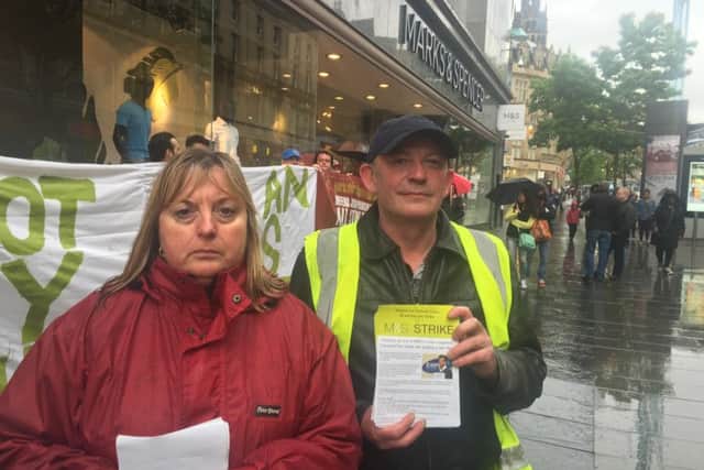 Bakers, Food and Allied Workers Union secretary Debbie Loy alongside Pennine Foods worker Mark Cotton from Handsworth