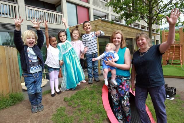 The official opening of the Grace Owen Nursery at the new redeveloped Park Hill flats in Sheffield. Pictured with some of the children are Nursery Manager Claire Boardman and Head Teacher Nancy Farrow. Photo: Chris Etchells