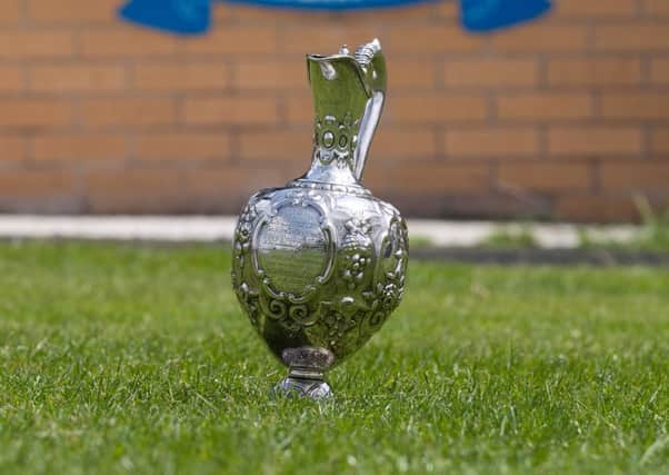 26/06/13 

Picture shows the Football Challenge Cup, believed to be the first football cup which was awrderd the Hallam Fottball Club in 1867. 
A game of 1858 rules football, known as 'Sheffield Rules' played at Hallam FC for the first time in 150 years. 

rossparry.co.uk / Tom Maddick