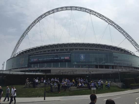 Sheffield Wednesday fans soaking up the atmosphere underneath the Wembley arch