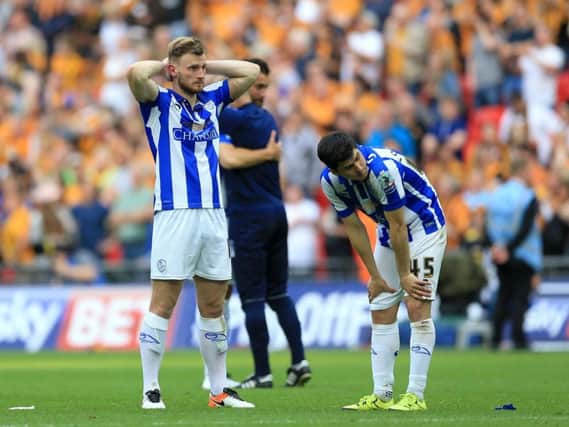 Tom Lees and Fernando Forestieri at the final whistle