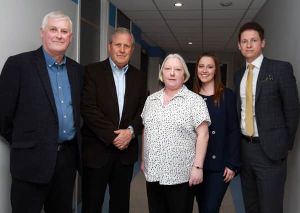 20 years ago Elaine Rennie was treated at the Royal Hallamshire on the neuro wards for the extremely rare condition of acromegaly. She turned 60 in December and instead of gifts she asked family and friends that  to make donations to the Neurocare department at the Hallamshire. Stephen and his sister Claire would never have grown up to know their mum if Prof Battersby has not performed this life saving surgery. Pictured are PeterRennie, Professor Robert Battersby, Elaine Rennie, Claire and Stephen.