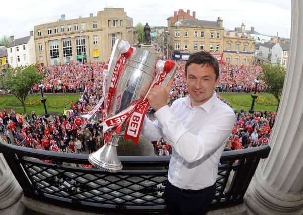 Manager Paul Heckingbottom with Play-off Trophy -  Picture: Simon Hulme