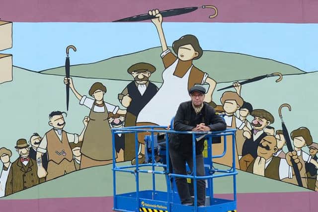 31 May 2016.....Sheffield artists Pete McKee has finished work on a huge 14m x 5m piece of art on one of the new buildings at north Sheffields Fox Valley development. Picture Scott Merrylees