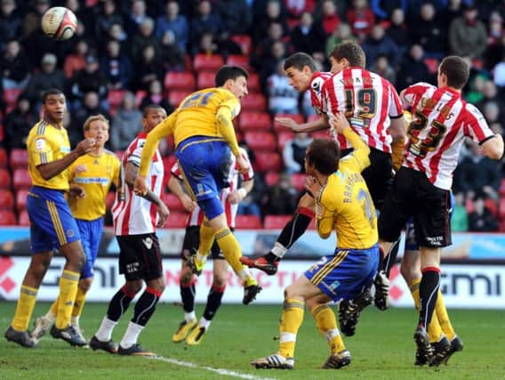 Action from the last time Derby County visited Bramall Lane, in February 2011. The two sides will meet in a pre-season friendly in July