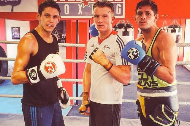 Dalton Smith (centre with the McDonnell twins) makes his World Series of Boxing debut this weekend