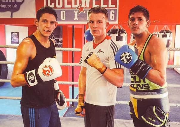 Dalton Smith (centre with the McDonnell twins) makes his World Series of Boxing debut this weekend