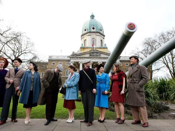 Enthusiasts of 1940s fashion get all dressed up to celebrate the Fashion on the Ration exhibition