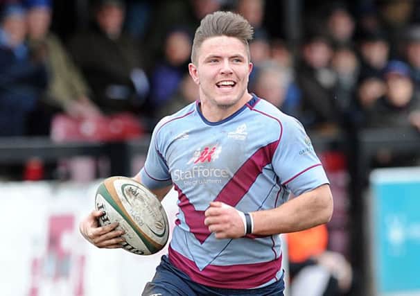 Will Owen celebrates a try for Rotherham. Picture Scott Merrylees
