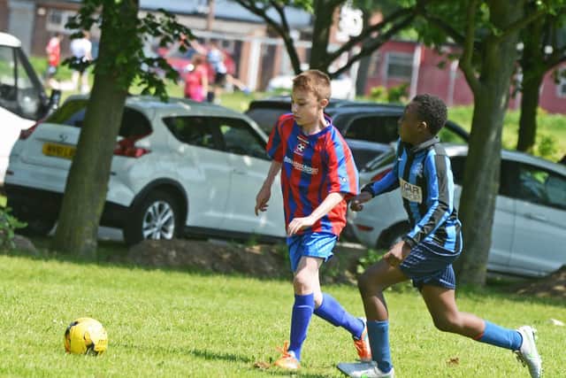Bessacarr Reds U12's v Hyde Park. Bessacarr's Joao Diniz (left) is pictured. Picture: Marie Caley