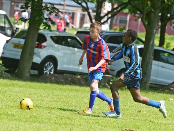 Bessacarr Reds U12's v Hyde Park. Bessacarr's Joao Diniz (left) is pictured. Picture: Marie Caley
