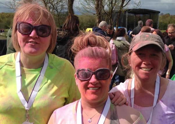Tone House Members from ltor Zoe, Sam & Dawn (who is the instructor) who raised money for Bluebell Wood after completing the Colour Dash.