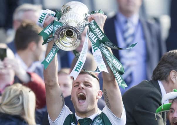 Anthony Stokes lifts the Scottish FA Cup with Hibs
