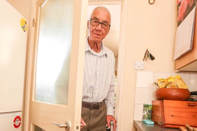 Keith Jobson, 83, who was horrified after finding a family of snakes living in his kitchen. See Ross Parry copy RPYSNAKE :